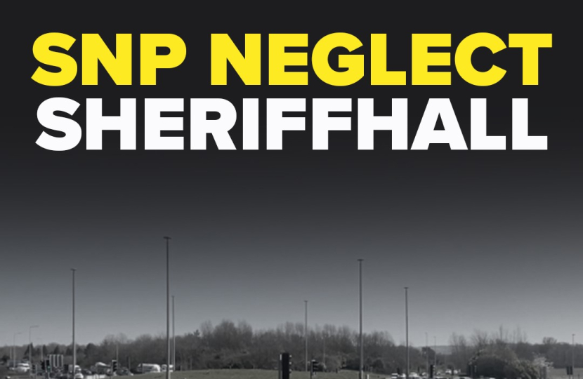 A photo of the Sheriffhall Roundabout with text that says 'SNP Neglect Sheriffhall'.