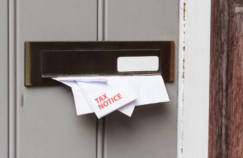 Tax bill coming through door