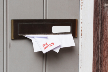 Tax bill coming through door